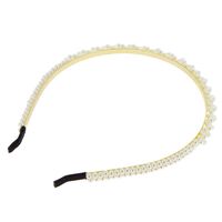 Serre-t&ecirc;te &agrave; perles 2 rangs tr&eacute;ss&eacute;s