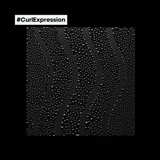 Eau de soin ravivatrice pour cheveux bouclés Curl Expression