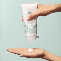 Conditionneur démêlant pour cheveux ondulés et bouclés Nutricurls